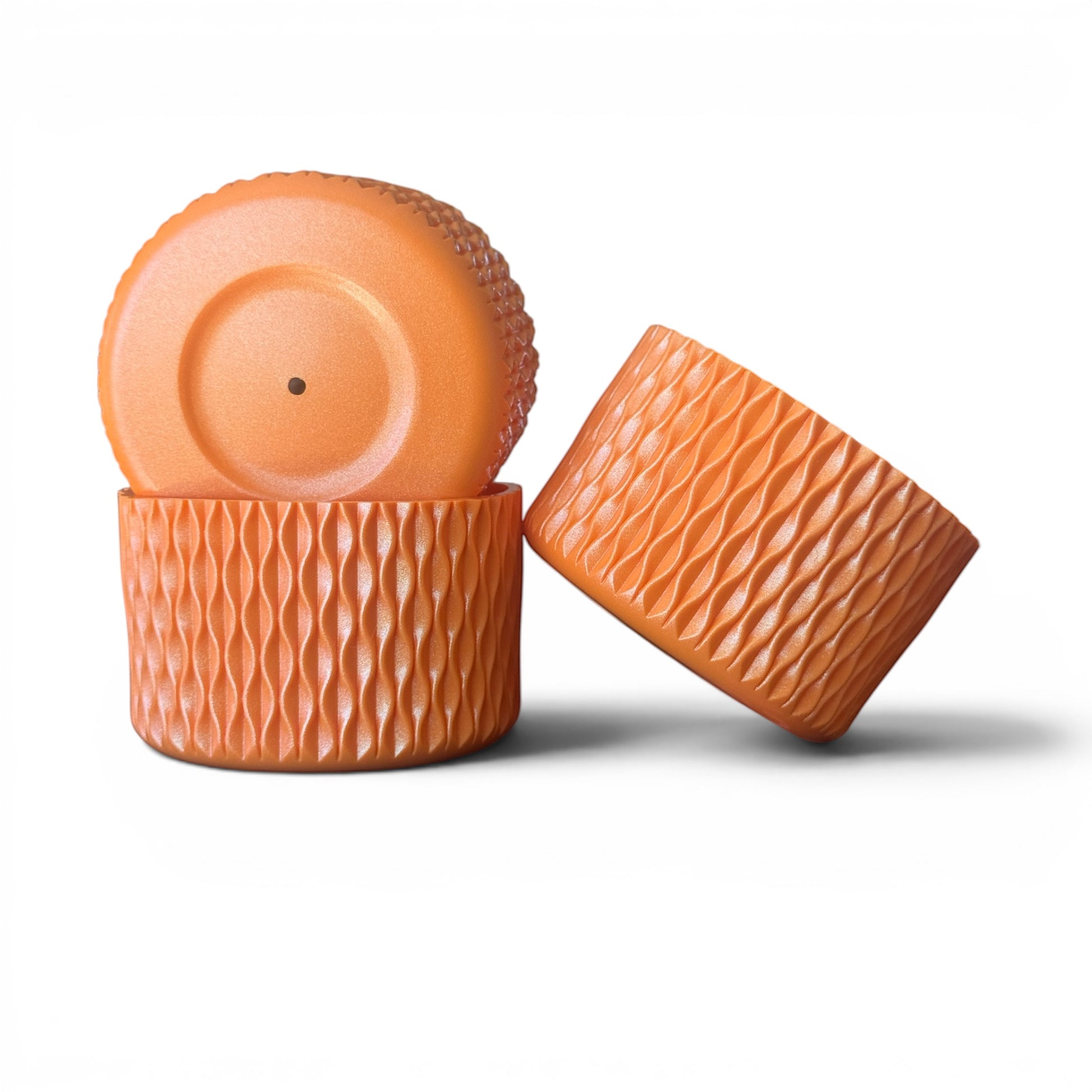 Next Nirvana tangerine shimmer silicone tumbler boots with textured wave pattern for 20-40oz drinkware