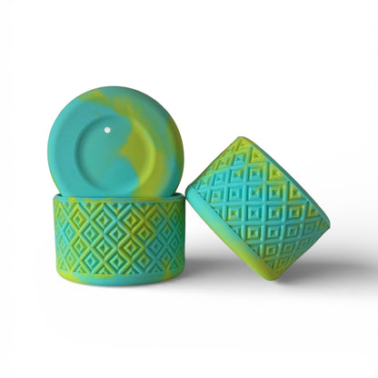Next Nirvana teal and lime silicone tumbler boot with a textured diamond pattern for Stanley and other tumblers.