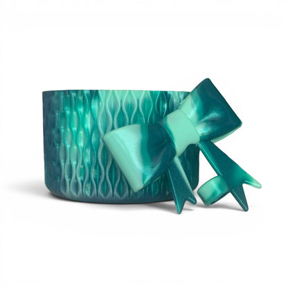 Next Nirvana Cold Kiss shimmer teal waves silicone tumbler boot and matching 3D bow straw topper set