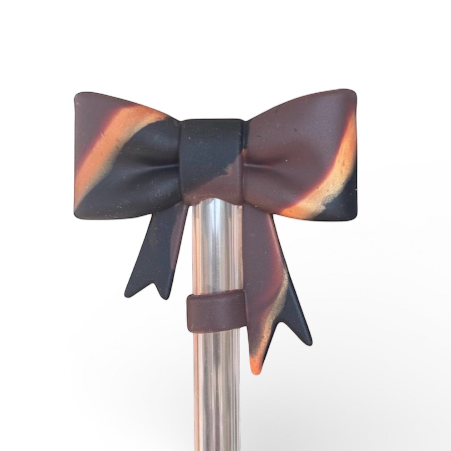 Next Nirvana Urban Smoke matte silicone 3D bow straw topper with black and orange marbled textured design