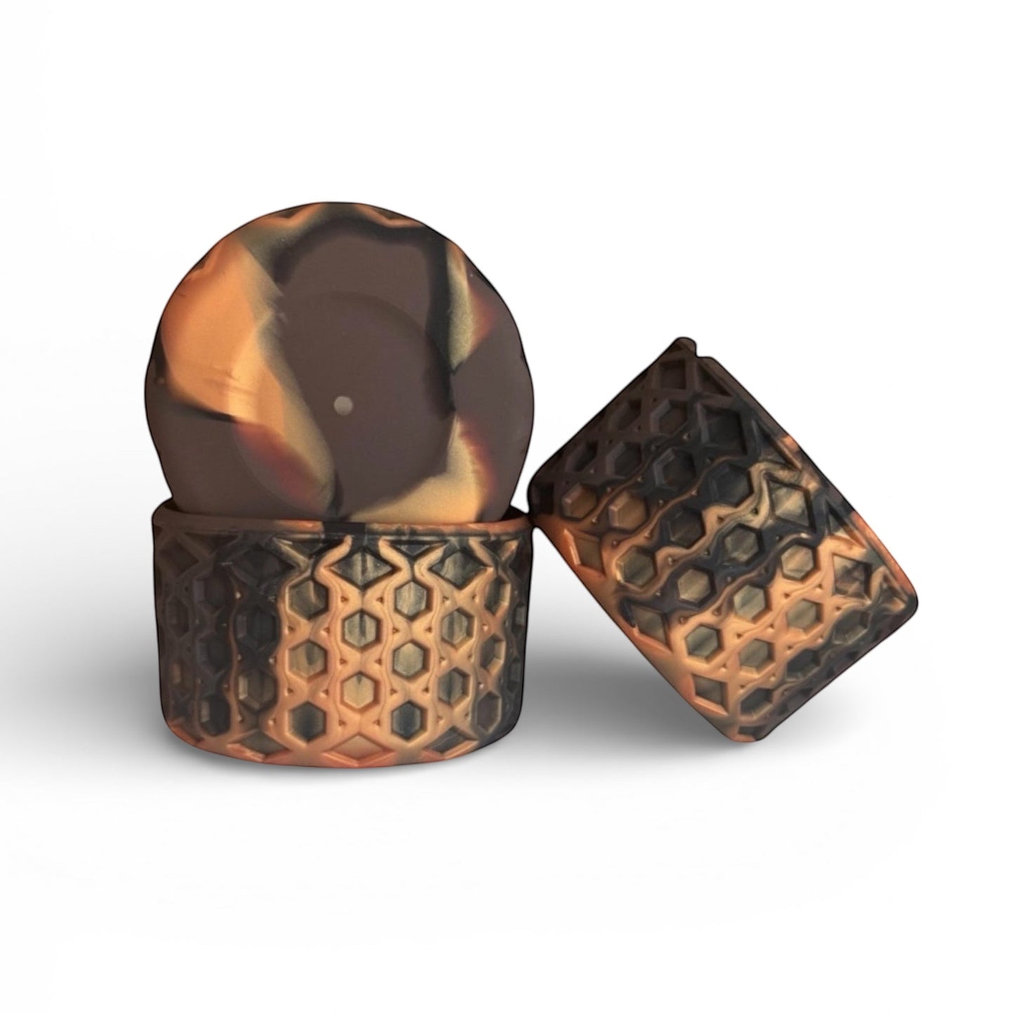 Next Nirvana Urban Smoke matte silicone tumbler boot with a 3D waffle texture in a black and orange swirl pattern.