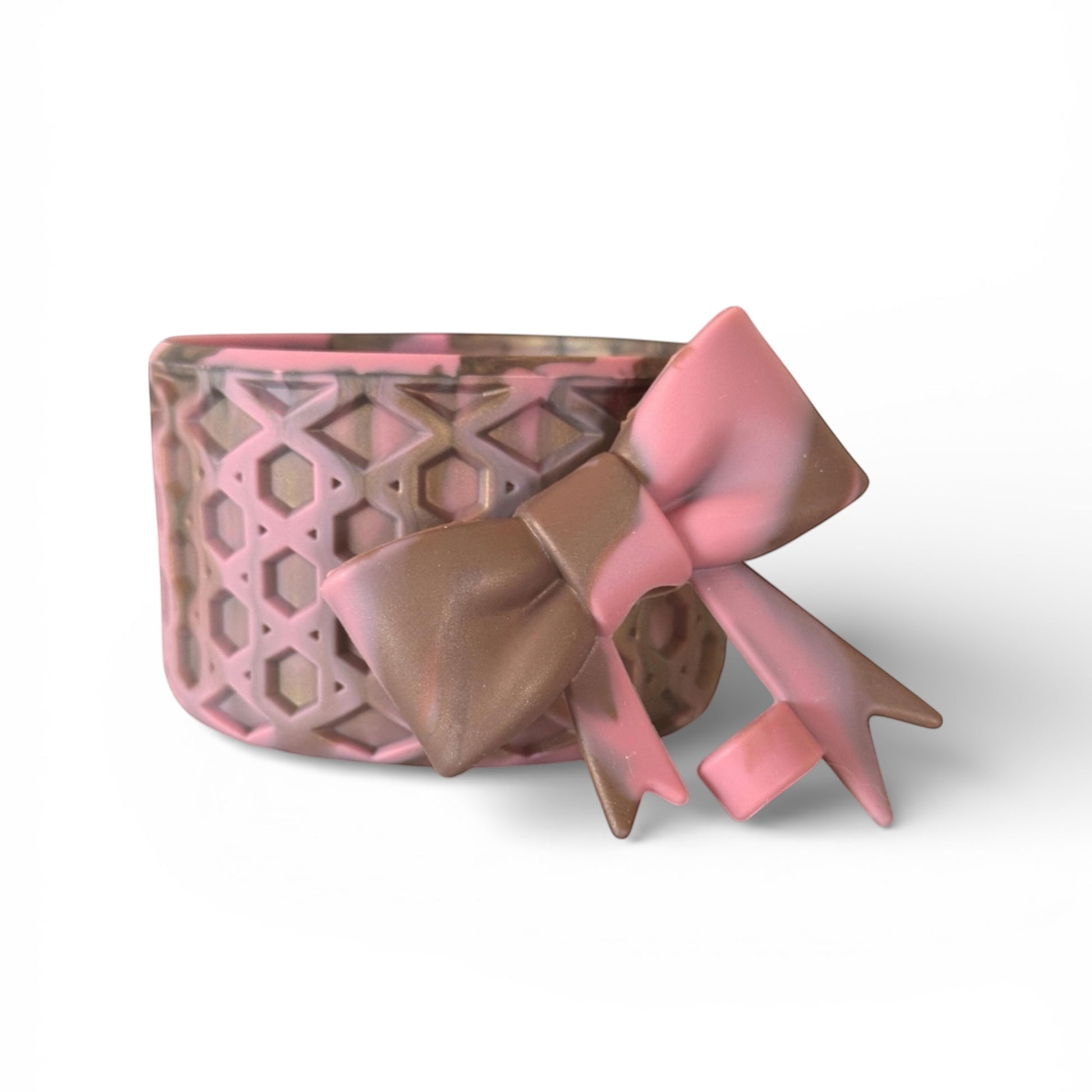 Next Nirvana antique pink and champagne waffle-textured silicone tumbler boot with a matching 3D bow straw topper.