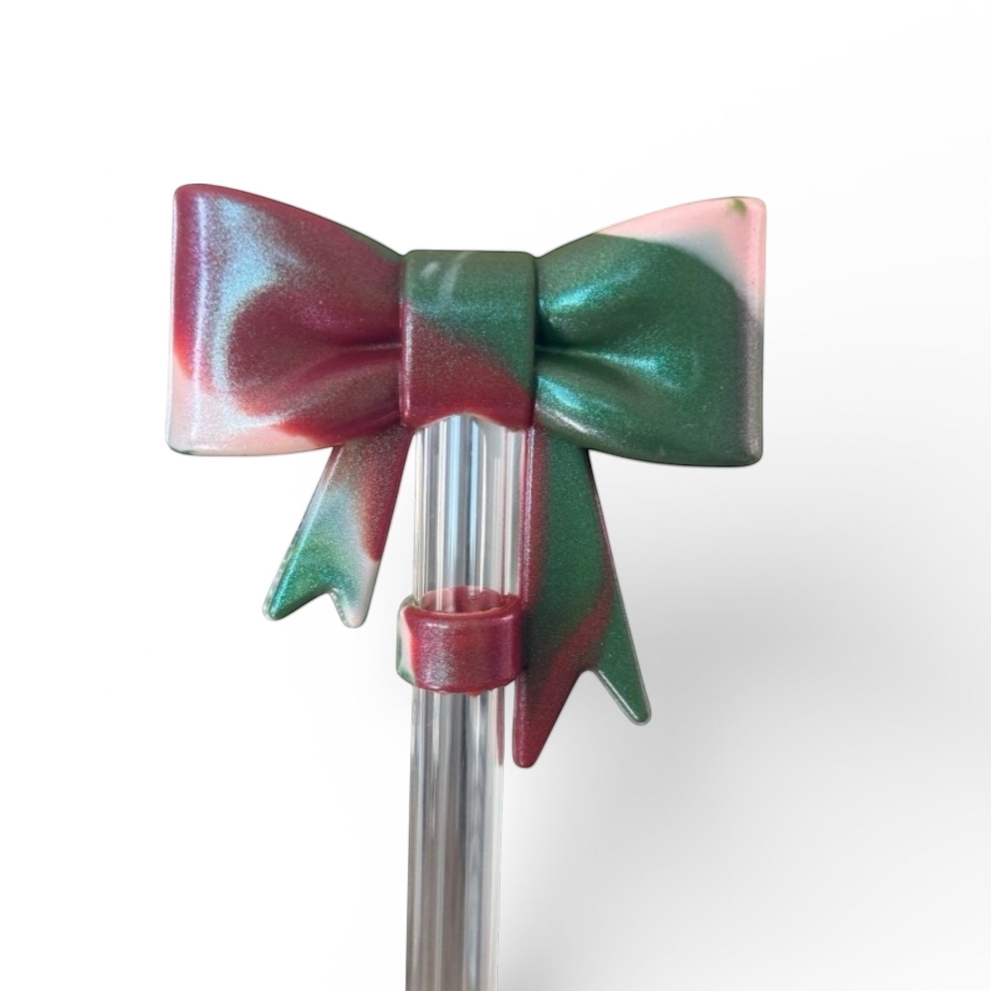 Next Nirvana watermelon moonshine shimmer silicone 3D bow straw topper for tumblers with red, green, and white swirl