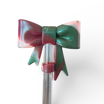 Next Nirvana watermelon moonshine shimmer silicone 3D bow straw topper for tumblers with red, green, and white swirl