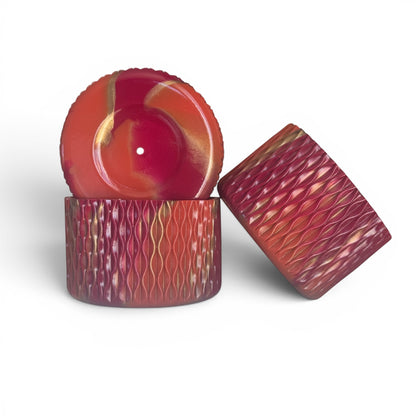 Next Nirvana Country Gold Waves silicone tumbler boot and matching 3D bow straw topper in red and gold marbled finish.